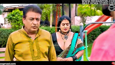Indian aunty in green saree teases mature man outdoors with deep cleavage