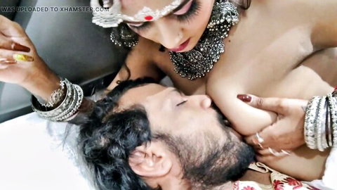 Desi Indian woman with sindoor and bangles breastfeeding bearded lover intimately