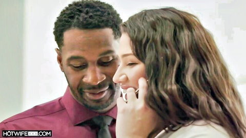 Handsome black man and brunette babe smiling intimately face-to-face