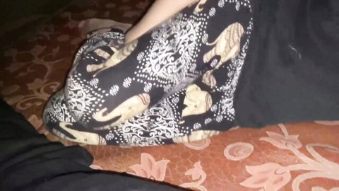 Indian Desi woman in elephant print pants squatting seductively in POV tease