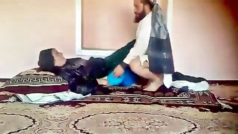 Afghani couple in explicit missionary sex with traditional robes