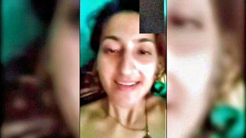 Smiling Nepali woman with dark hair in gangbang video thumbnail