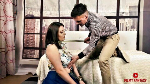 Indian beauty bound with ropes, groped by man in white top and skirt