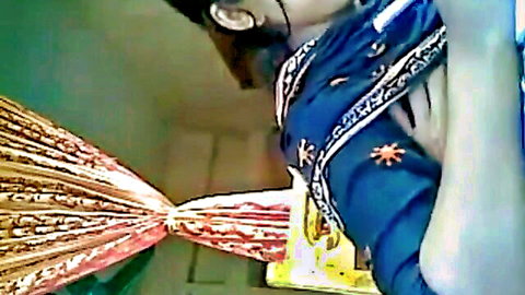 Bangladeshi tuition teacher in blue sari teasing student during fun sex session