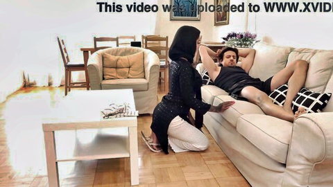 Yasmina Khan in hijab teases muscular man on couch, desi maid seduction