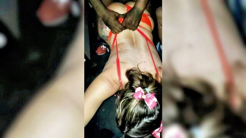 MattnNancy2 bound in red straps, restrained in gloryhole gangbang scene