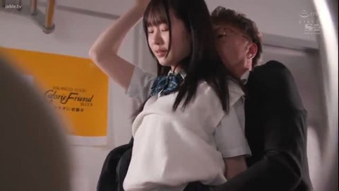 Asian schoolgirl in uniform kissed passionately by suited man